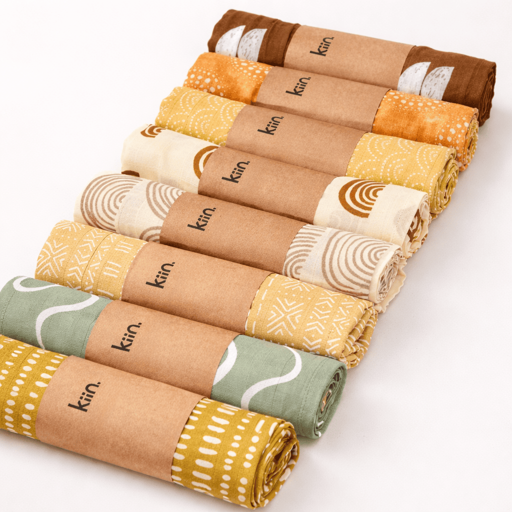 Kraft paper belly bands with printed branding wrapped around retail product packaging
